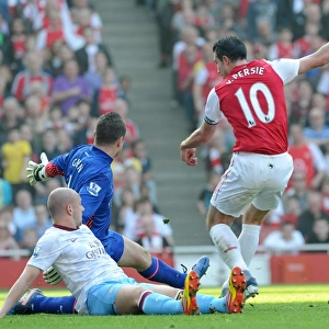 Robin van Persie (Arsenal) shoots past Shay Given and Alan Hutton (Villa)