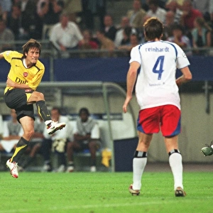 Tomas Rosicky shoots past substitute goalkeeper Stefan Wachter to score the 2nd Arsenal goal
