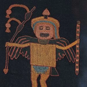 Llama wool fabric used to wrap mummies, detail with embroidered figure of warrior, from Peru