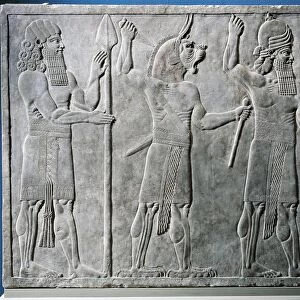 Relief with protective deities, from Nineveh