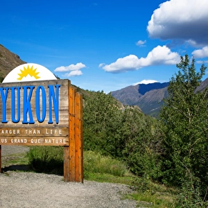 A Yukon Welcome Sign on the Border of Alaska with the Northwest and Dempster Highway, Yukon Territory, Canada