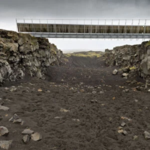 Bridge between the continents crosses the fracture zone between the American and European tectonic plates, Reykjanesskagi peninsula, Iceland