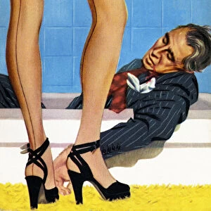 Legs of Woman Standing by Man Lying in a Bathtub