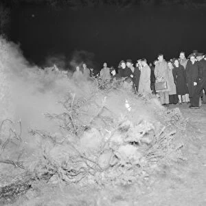 A crowd gathers at the site of a fire on Dartford Heath, Kent. 1939