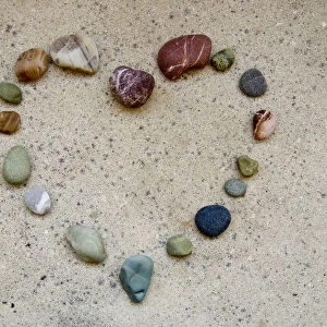 Heart shape made of various coloured Cypriot pebbles credit: Marie-Louise Avery