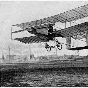 Henri Farman (1874-1958) at Issy-les-Moulineaux in his plane the Voisin-Farman 1