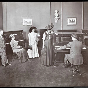A piano showroom, New York, 1907 (silver gelatin print)