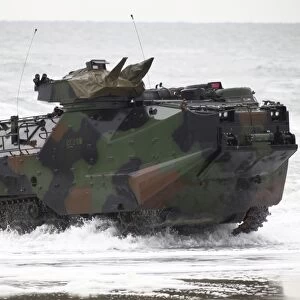 An amphibious assault vehicle drives toward Onslow Beach