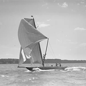 The 8 Metre sailing yacht Endrick sailing downwind under spinnaker, 1911. Creator