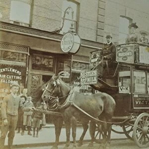 Horse-drawn omnibus and passengers, London, 1900