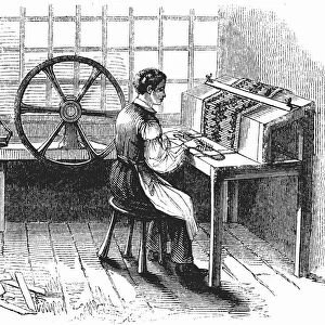 Man operating machine punching cards for Jacquard looms, 1844