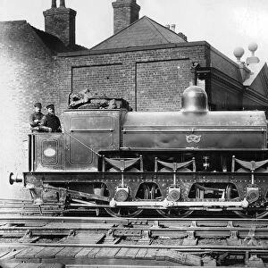 North Staffordshire 0-6-0 steam locomotive with driver and fireman on the footplate, 19th century