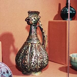 Persian (Kashan) Ewer with cockerels head and tail handle, early 13th century