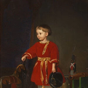 Portrait of a boy in a red dress with military toys