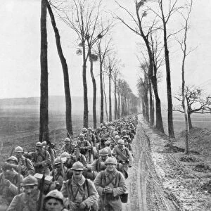 A regiment of French infantry going to the front, France, 30 March 1918