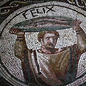 Roman mosaic of a man carrying fish
