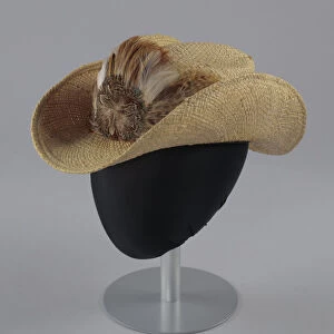 Straw cowboy hat with feathered hat band worn by Arthur Lee, ca. 2000. Creator: Unknown