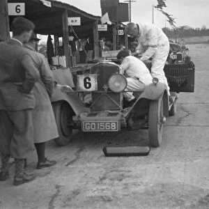 Talbot 90 of E and SJ Burt in the pits at the JCC Double Twelve race, Brooklands, May 1931