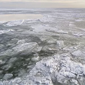 Aerial view of frozen Markermeer with drifting ice after a long period of frost in