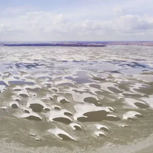 Aerial view of melting ice in the Gouwzee after a long period of frost in February 2018