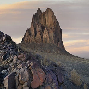 Rock formation at sunset, remenant basalt core of extict volcano, Ship Rock, New Mexico