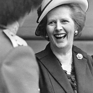 Margaret Thatcher laughing with a Guards Officer during official ceremony - May 1985