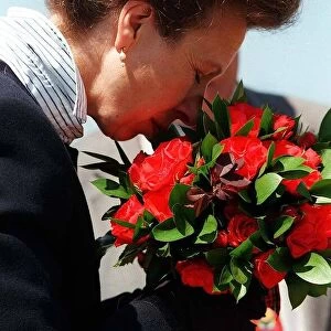 Princess Anne smells bouquet of flowers at opening of Gardening Festival Strathclyde Park