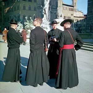 Priests-tourists in Piazza della Signoria, Florence