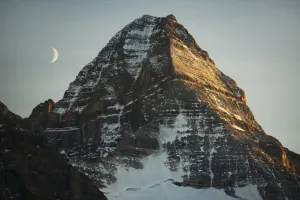 Crescent moon and summit of Mount Assiniboine, Mount Assiniboine Provincial Park, British Columbia Crescent moon and summit of Mount Assiniboine, Mount Assiniboine Provincial Park, British Columbia