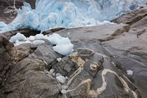 September Prints: end of Nigardsbreen glaciar with ice on rocks, Nigardsbreen, Norway