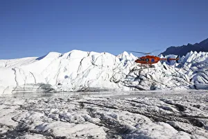 Rescue helicopter landing on the Matanuska Glacier, Alaska, United States Rescue helicopter landing on the Matanuska Glacier, Alaska, United States