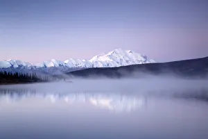 September Prints: Scenic view of Mount Denali and the Alaska Range while morning mist rises from Wonder Lake