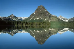 Sinopah Mountain reflects in Two Medicine Lake, southeastern part of Glacier National Park Sinopah Mountain reflects in Two Medicine Lake, southeastern part of Glacier National Park